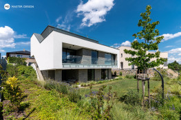 Třípatrový dům ve svahu s luxferovou stěnou - Praha - hlavní vizualizace