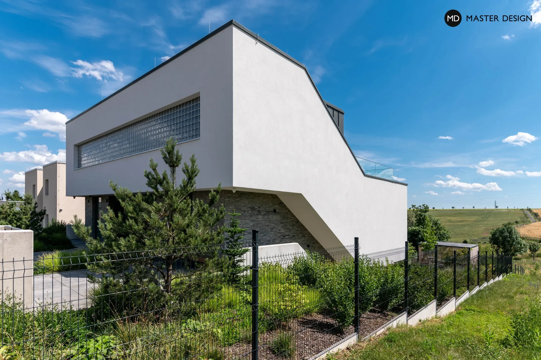 Třípatrový dům ve svahu s luxferovou stěnouPraha - vizualizace6